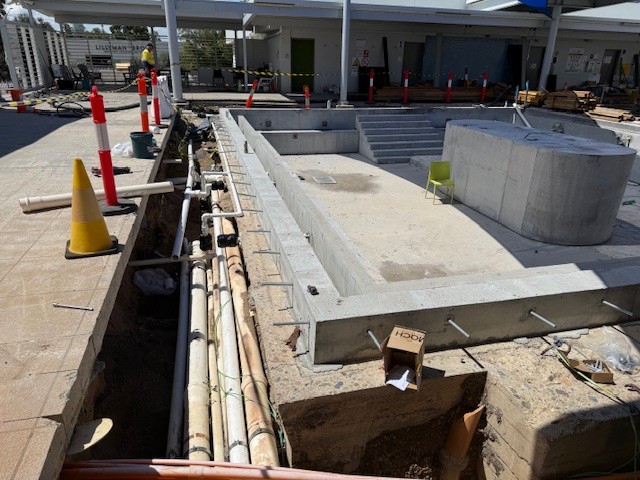 Extensive piping and electrical conduit installations around the Active Pool